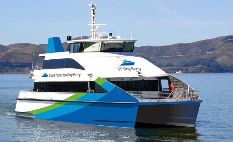 A modern SF Bay Ferry with "San Francisco Bay Ferry" branding sails on a calm body of water. Hills and parts of the Golden Gate Bridge are visible in the background under a clear blue sky.